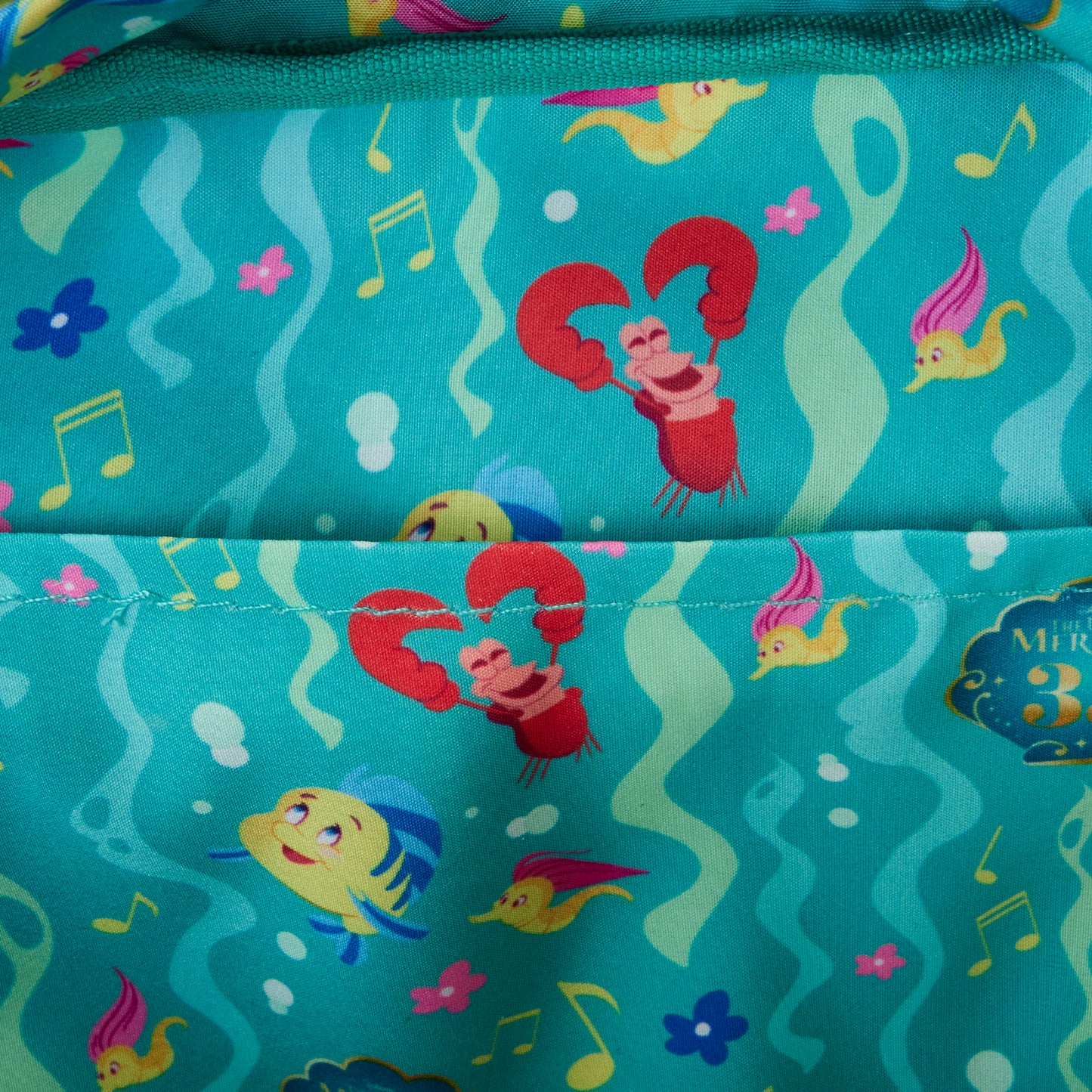 The Little Mermaid 35th Anniversary Life is the Bubbles All-Over Print Nylon Square Mini Backpack LFY